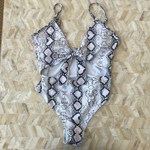 NEVER WORN Printed One Piece Bathing Suit with Cut out!